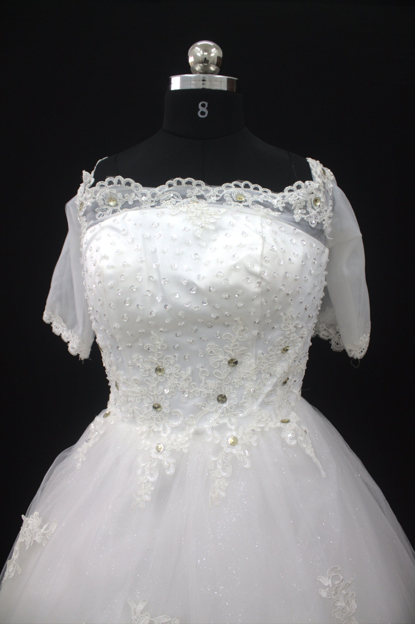 "White Beaded Tulle Ball Gown Wedding Dress with Sheer Lace Short Sleeves & Satin Waist Detail-White Gown" Product code-2019