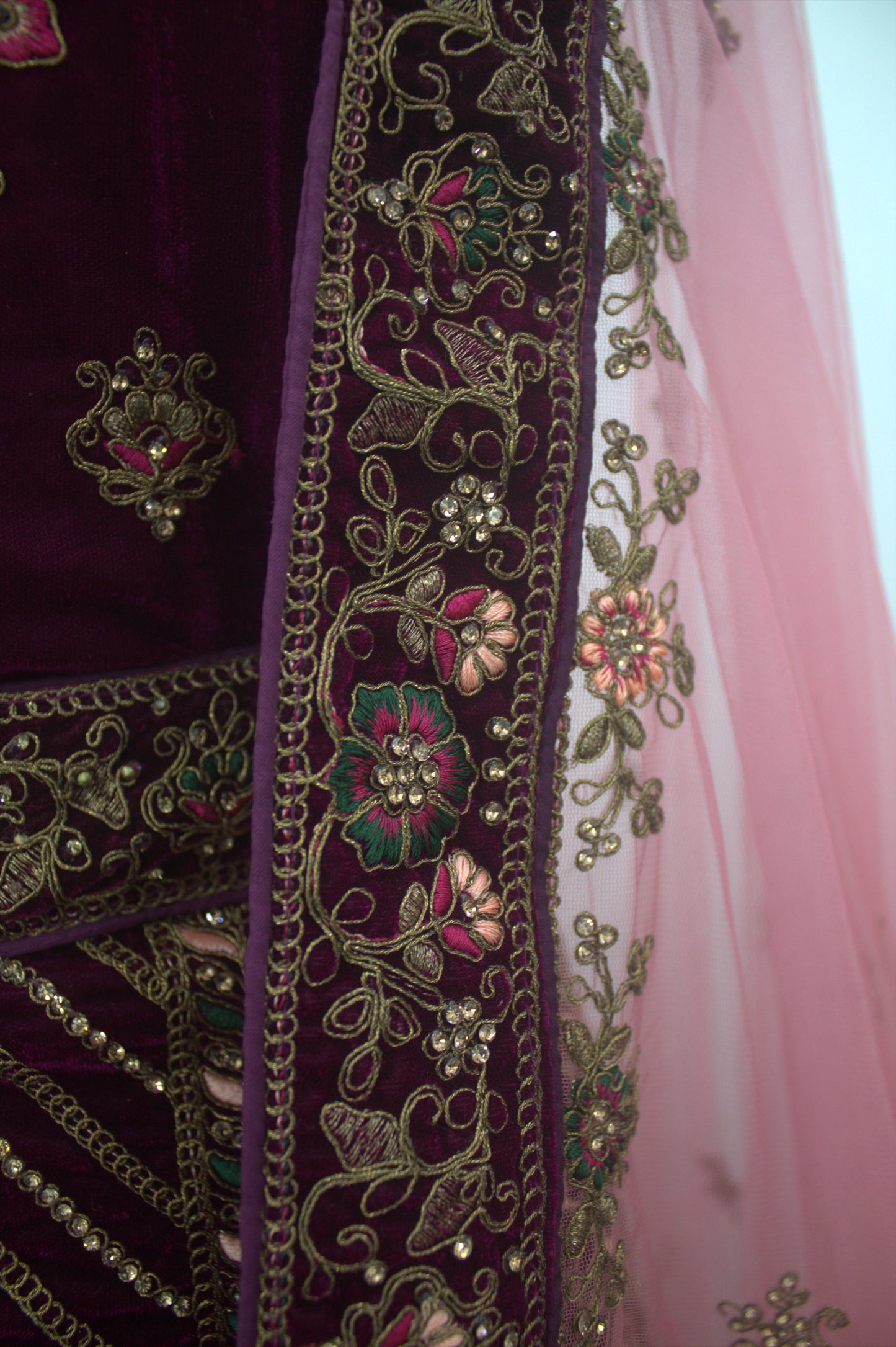 “Plum Velvet Bridal Lehenga with Intricate Floral Embroidery & Net Dupatta” Product code-1310
