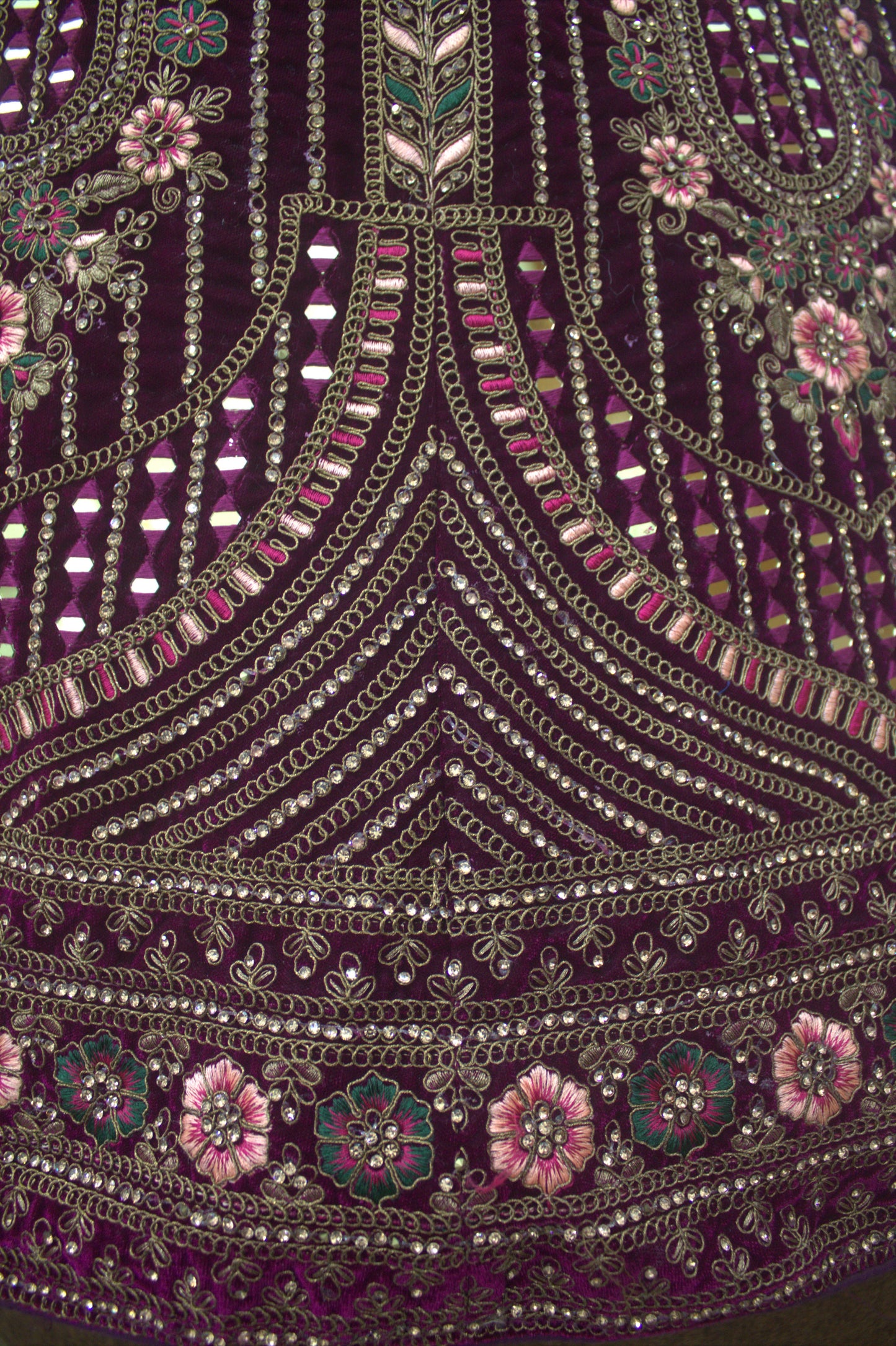 “Plum Velvet Bridal Lehenga with Intricate Floral Embroidery & Net Dupatta” Product code-1310
