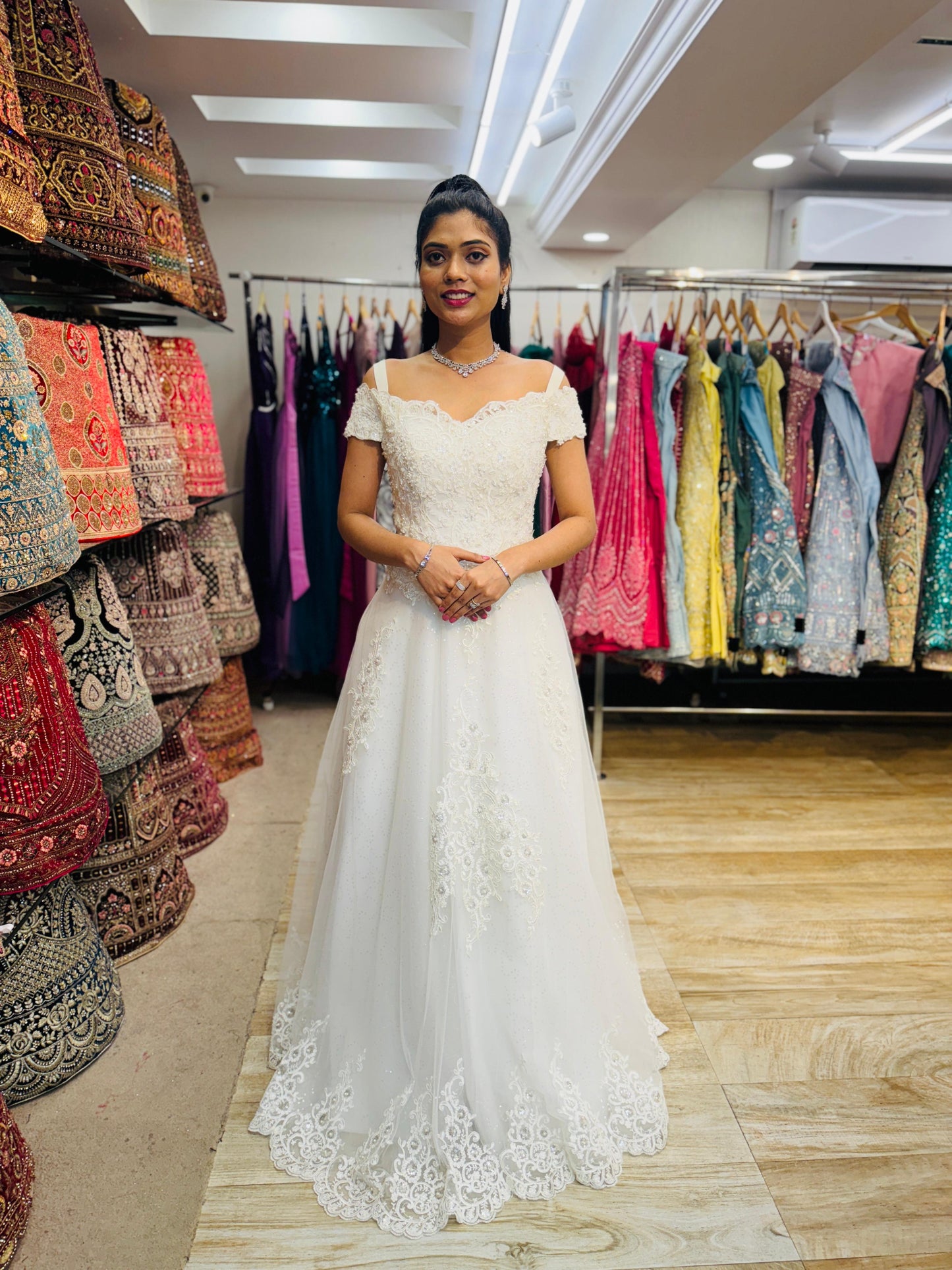 "Romantic Off-Shoulder Lace Bridal Gown with Elegant A-Line Design and Delicate Beading White Gown" Product code-2011