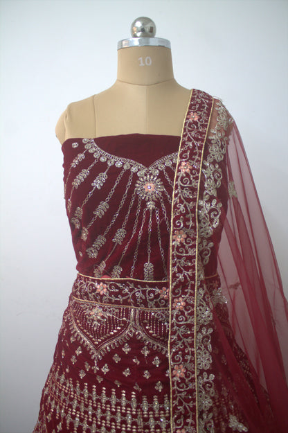 "Exquisite Maroon Bridal Lehenga Choli with Intricate Gold Embroidery – Traditional Indian Wedding Wear with Elegant Net Dupatta" Product code-1328