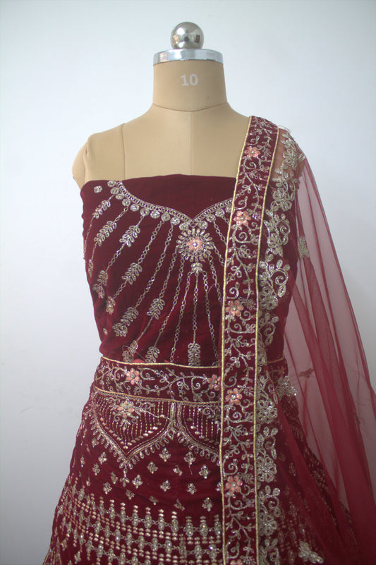 "Exquisite Maroon Bridal Lehenga Choli with Intricate Gold Embroidery – Traditional Indian Wedding Wear with Elegant Net Dupatta" Product code-1328
