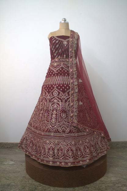"Exquisite Maroon Bridal Lehenga Choli with Intricate Gold Embroidery – Traditional Indian Wedding Wear with Elegant Net Dupatta" Product code-1328