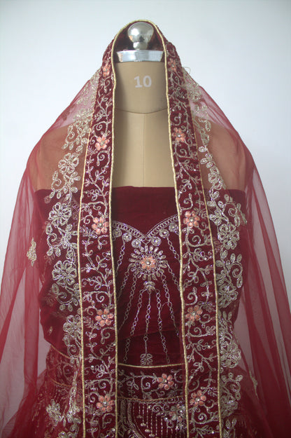"Exquisite Maroon Bridal Lehenga Choli with Intricate Gold Embroidery – Traditional Indian Wedding Wear with Elegant Net Dupatta" Product code-1328