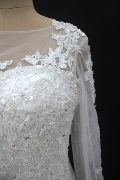 "Luxury Lace Wedding Dress – Full-Length Train, Sheer Detailing & Classic Silhouette-White Gown" Product code-2017
