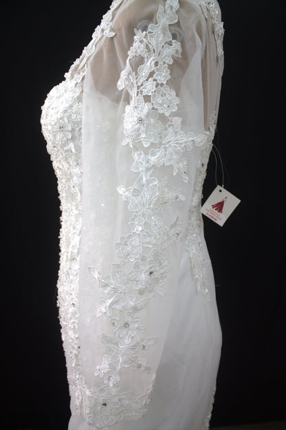 "Luxury Lace Wedding Dress – Full-Length Train, Sheer Detailing & Classic Silhouette-White Gown" Product code-2017