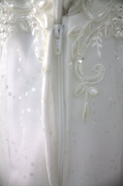 "Romantic Off-Shoulder Lace Bridal Gown with Elegant A-Line Design and Delicate Beading White Gown" Product code-2011