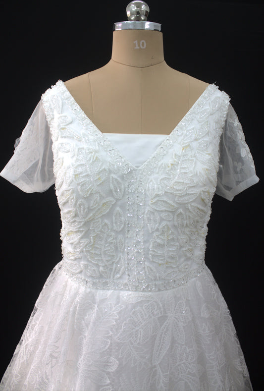 "Liora Elegant A-Line Lace Wedding Gown with Floral Embroidery & Sheer Short Sleeves-White Gown" Product code-2013