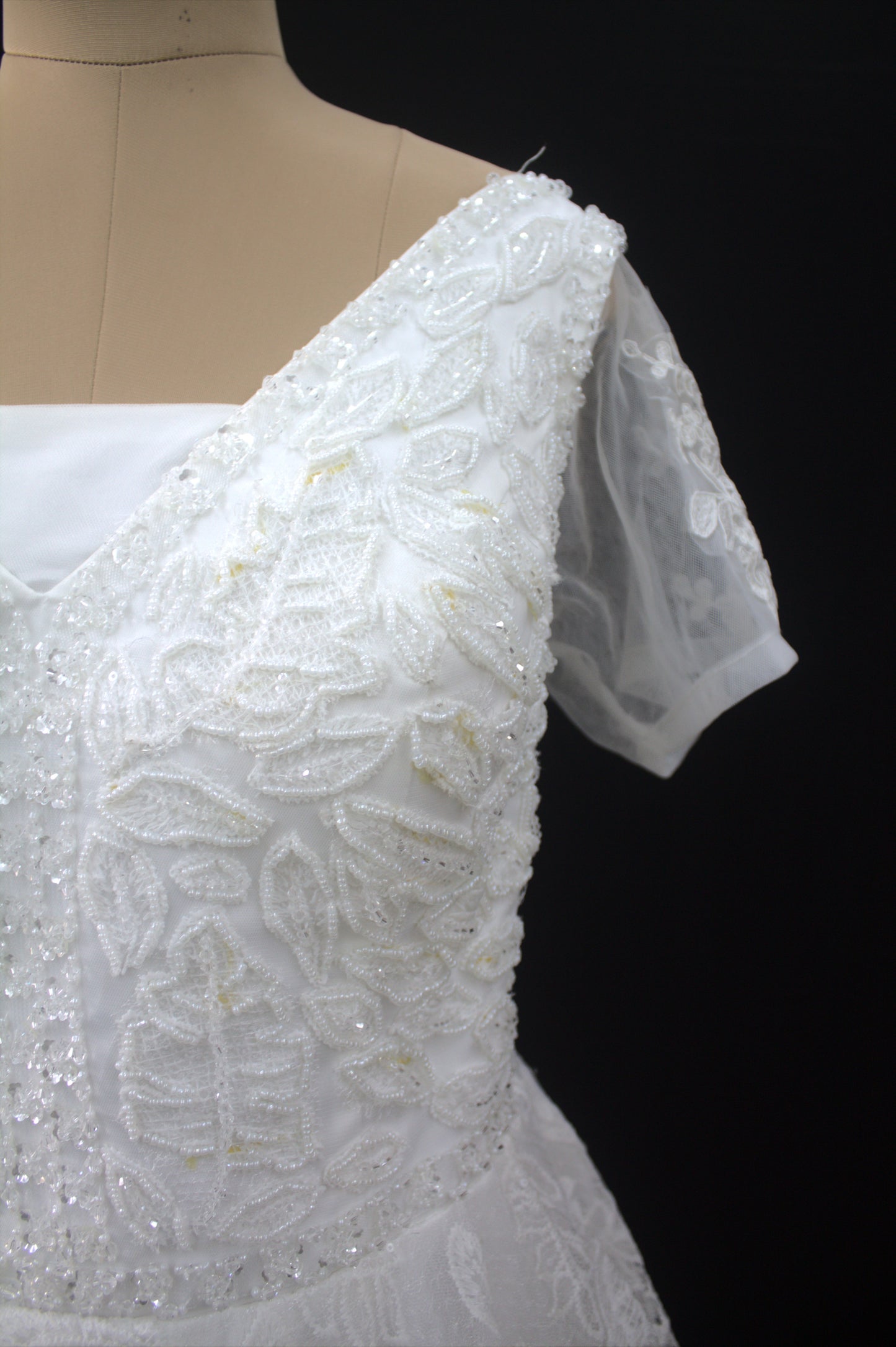 "Liora Elegant A-Line Lace Wedding Gown with Floral Embroidery & Sheer Short Sleeves-White Gown" Product code-2013