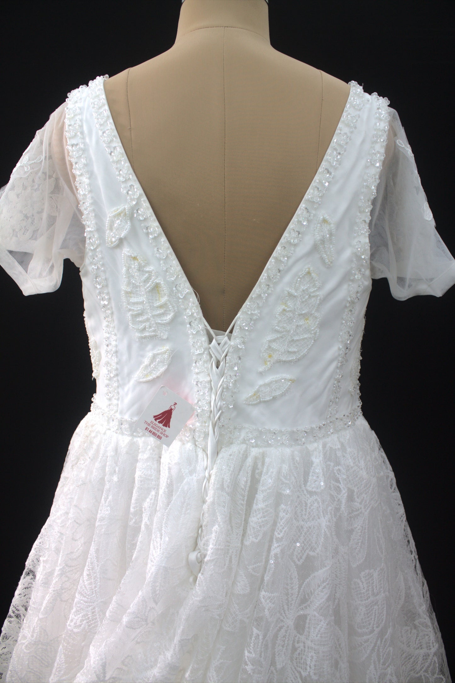 "Liora Elegant A-Line Lace Wedding Gown with Floral Embroidery & Sheer Short Sleeves-White Gown" Product code-2013