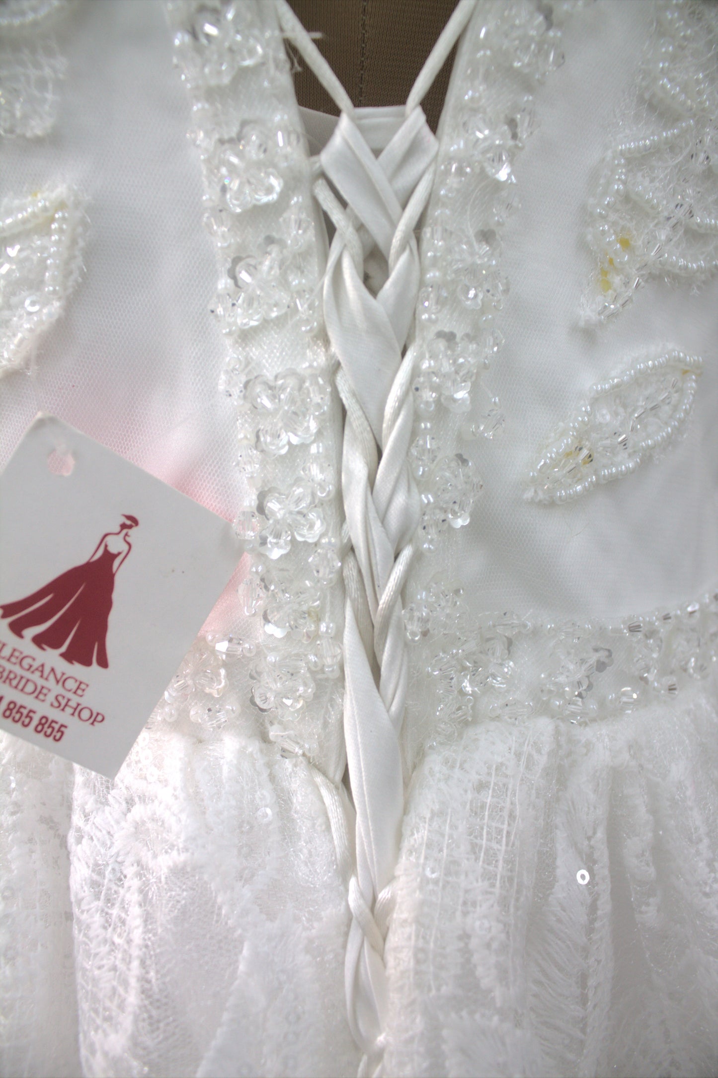 "Liora Elegant A-Line Lace Wedding Gown with Floral Embroidery & Sheer Short Sleeves-White Gown" Product code-2013
