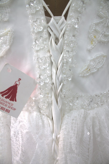 "Liora Elegant A-Line Lace Wedding Gown with Floral Embroidery & Sheer Short Sleeves-White Gown" Product code-2013
