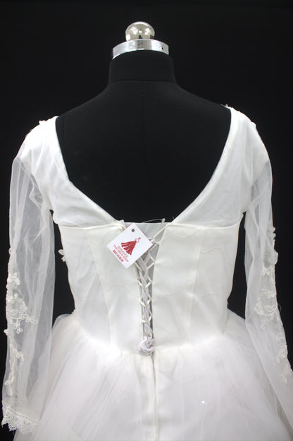 “Celeste Elegant Long Sleeve Ball Gown Wedding Dress with Lace Appliqués & Illusion Neckline-White Gown” Product code-2099