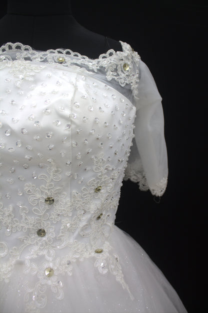"White Beaded Tulle Ball Gown Wedding Dress with Sheer Lace Short Sleeves & Satin Waist Detail-White Gown" Product code-2019