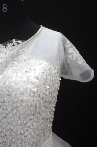 "White Beaded Tulle Ball Gown Wedding Dress with Sheer Sleeves & Lace Appliqués-White Gowns" Product code-2003
