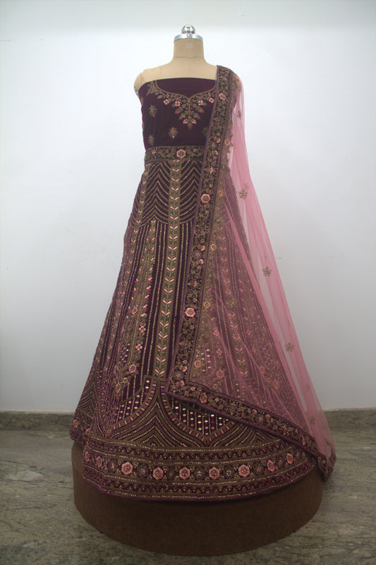 “Plum Velvet Bridal Lehenga with Intricate Floral Embroidery & Net Dupatta” Product code-1310