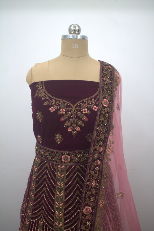 “Plum Velvet Bridal Lehenga with Intricate Floral Embroidery & Net Dupatta” Product code-1310